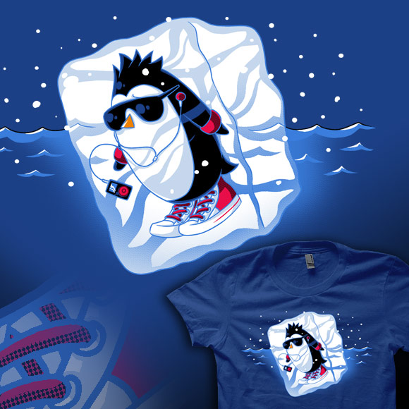 too-cool On a dark royal blue shirt there is a design of a penguin with sunglasses and flashy red hightops red arm bands and a black and red music player that's been froozen in ice and is floating in the ocean. The penguin looks worried.